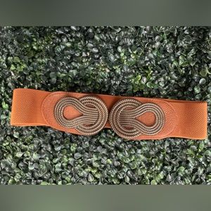 Brown fashion belt with metal detail